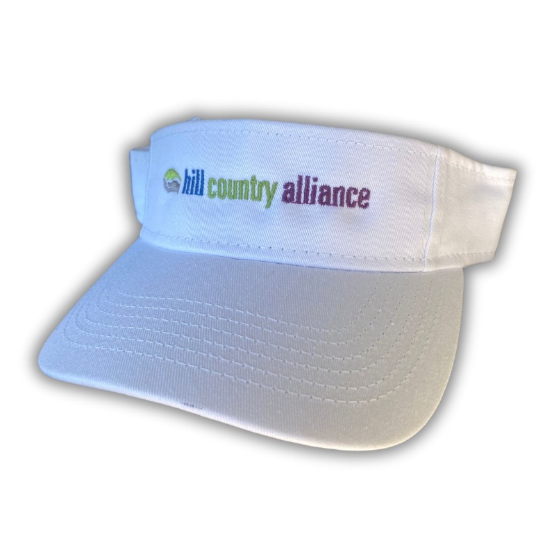 Product Description: Limited Edition White Visor</br></br>HCA is proud to announce ourfirst hat release - supply is limited so get yours while supplies last! These white visors are the perfect way to show your love of HCA and keep the sun away!Each visorfeatures the colorful HCA logo and hasa velcro strapfor a perfect fit. Produced locally byRiverCity Screen Printing & Embroidery.</br> White HCA Visor